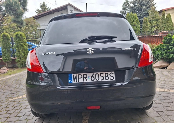 Suzuki Swift cena 34700 przebieg: 100200, rok produkcji 2015 z Żychlin małe 326